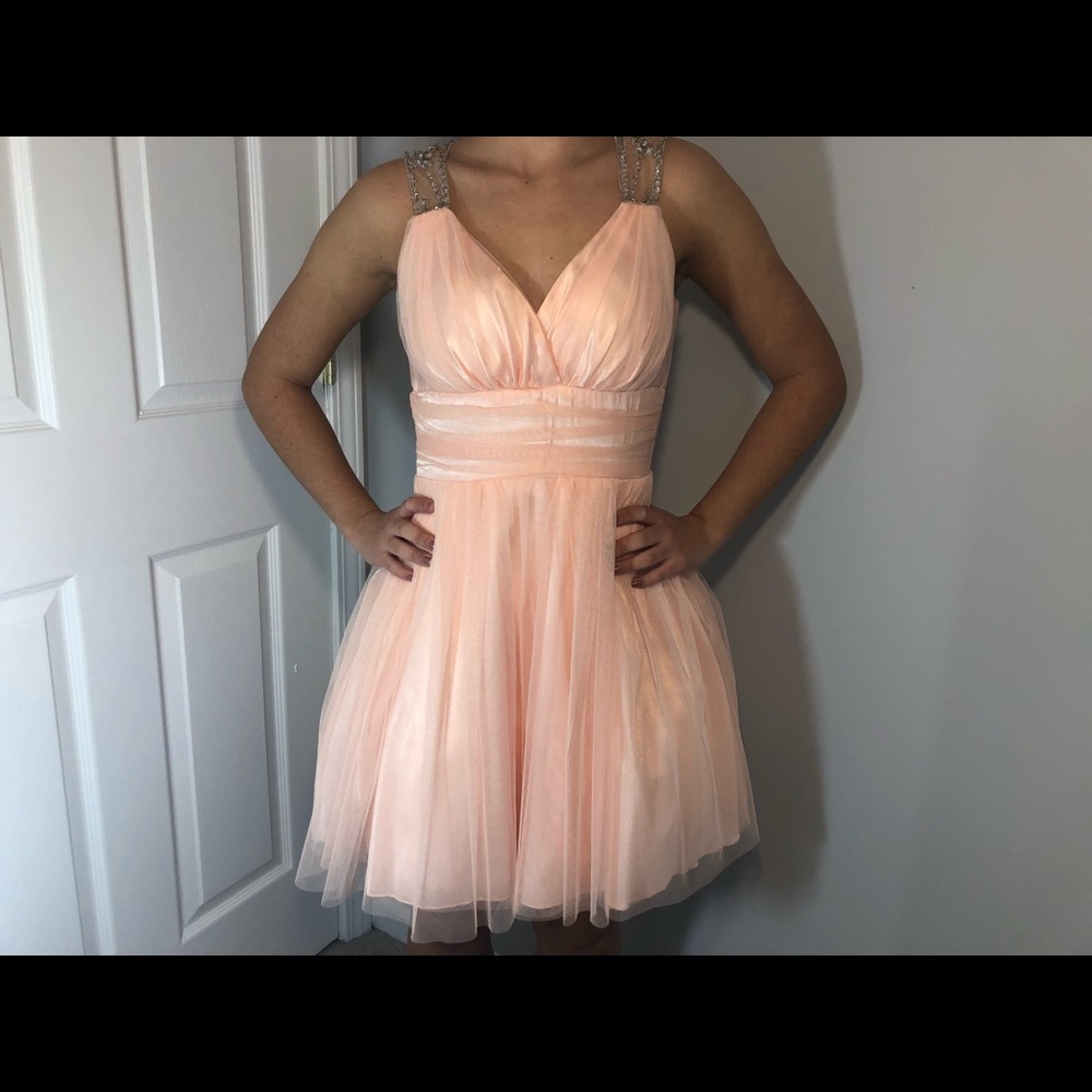 B. Smart peach pink dress